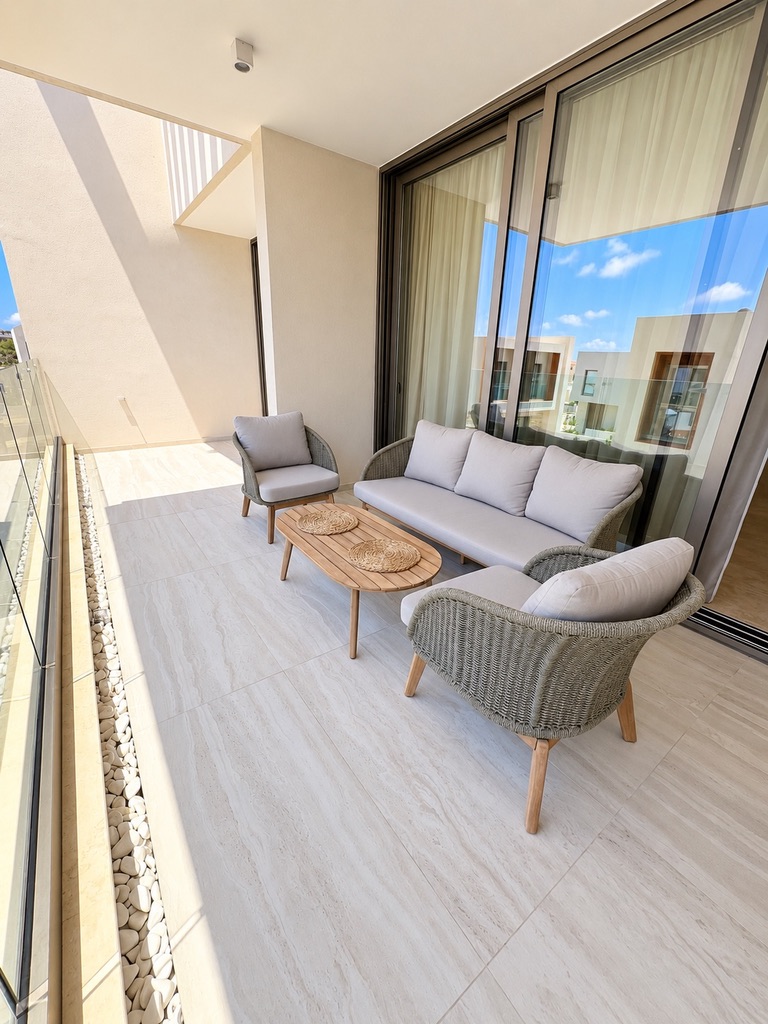 Representative furnished private balcony at an Avalon Gardens serviced apartment