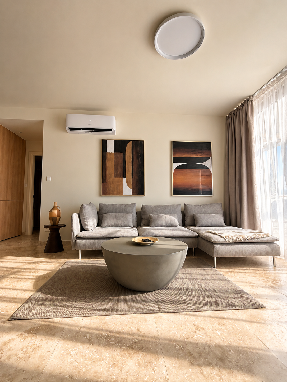 Spacious living area with sofa at Avalon Gardens A202