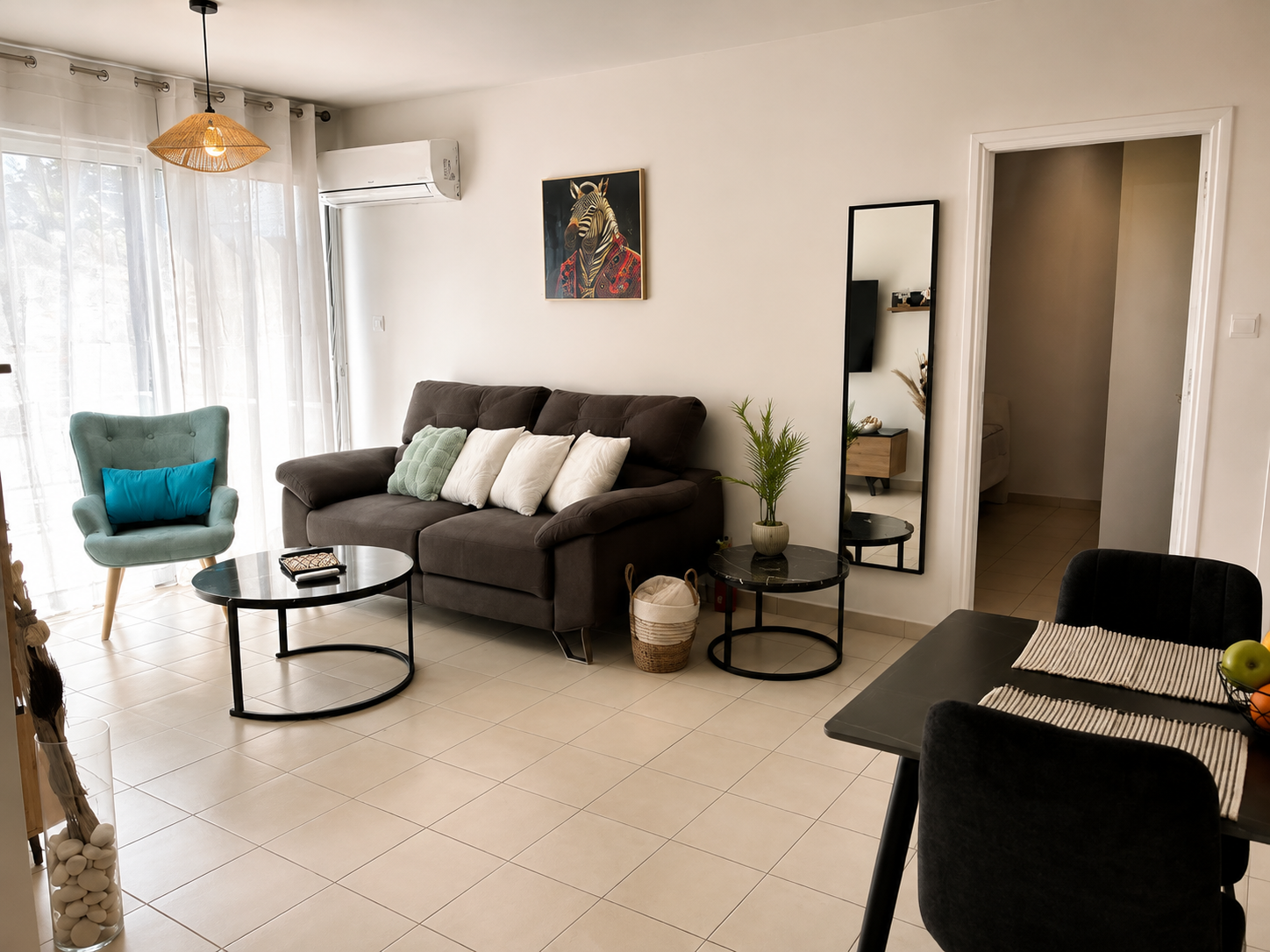 Comfortable living room and dining area at Pervolia 206 Apartment