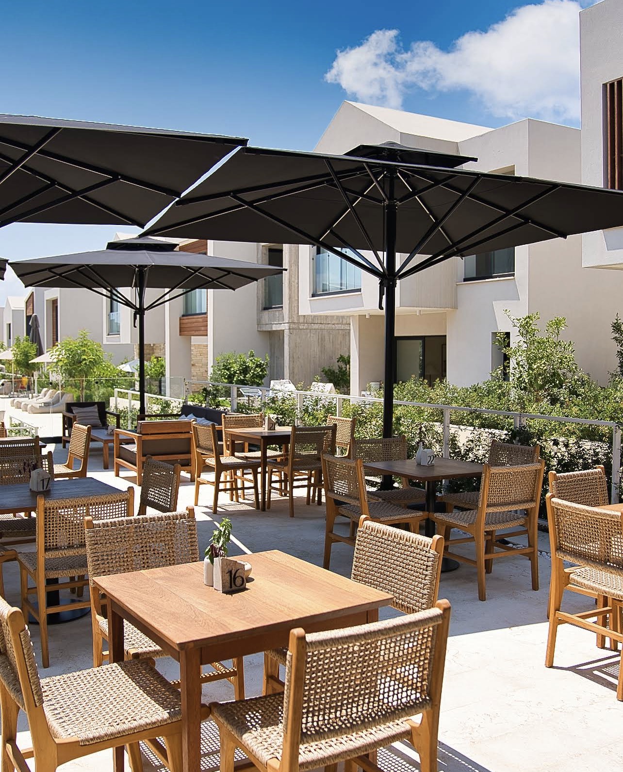 Outdoor restaurant terrace at Avalon Gardens