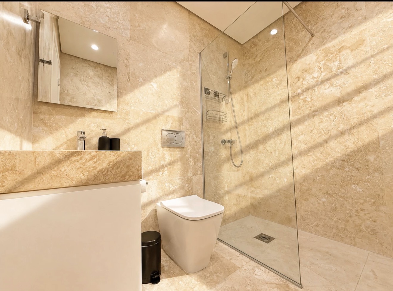Modern walk-in shower bathroom at Avalon Gardens B203