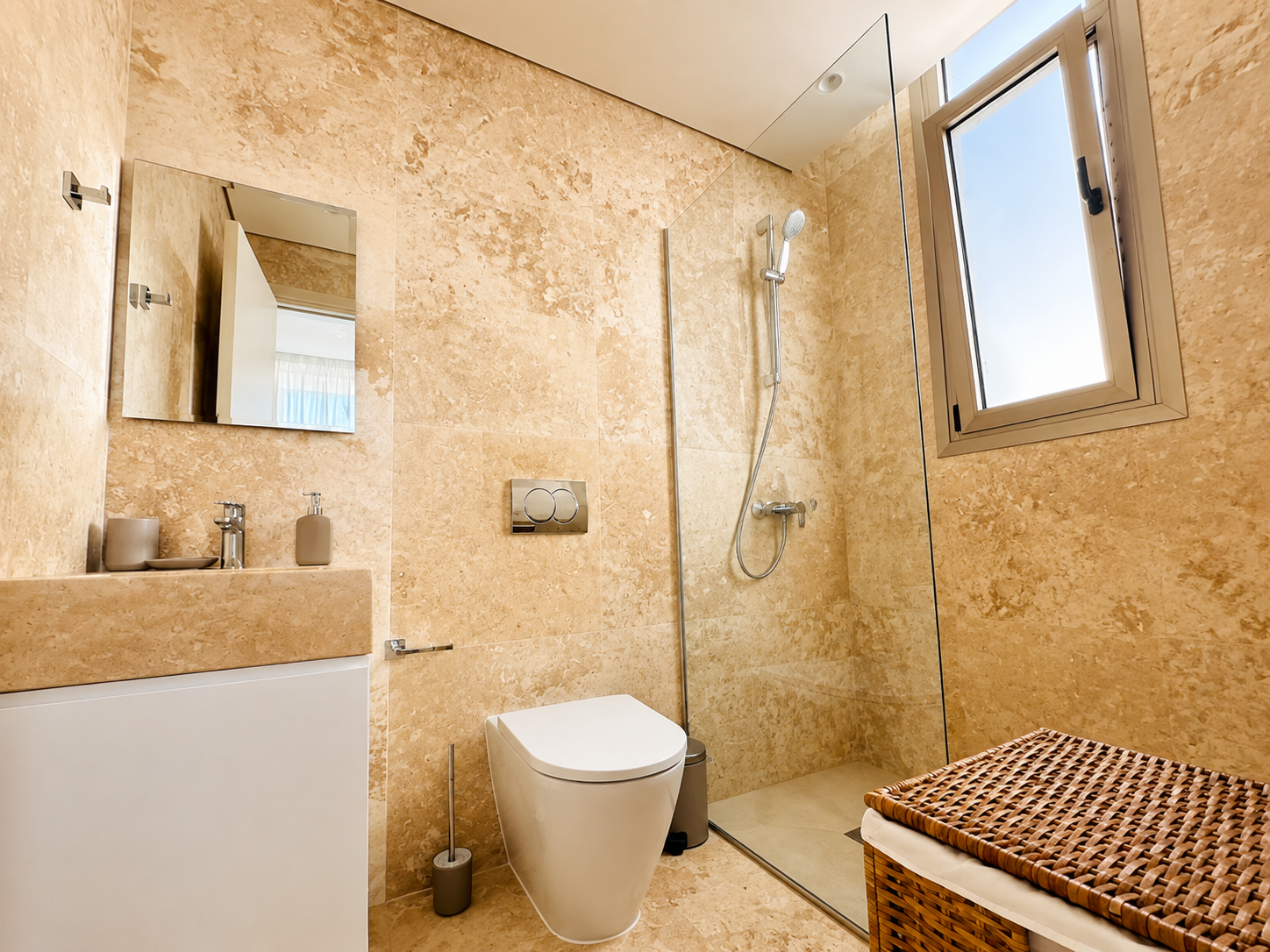 Modern bathroom with walk-in shower at Avalon Gardens B101