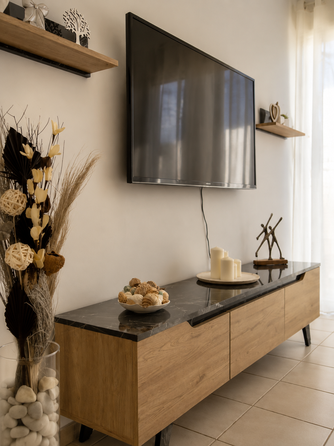 Smart TV and living-room storage at Pervolia 206 Apartment