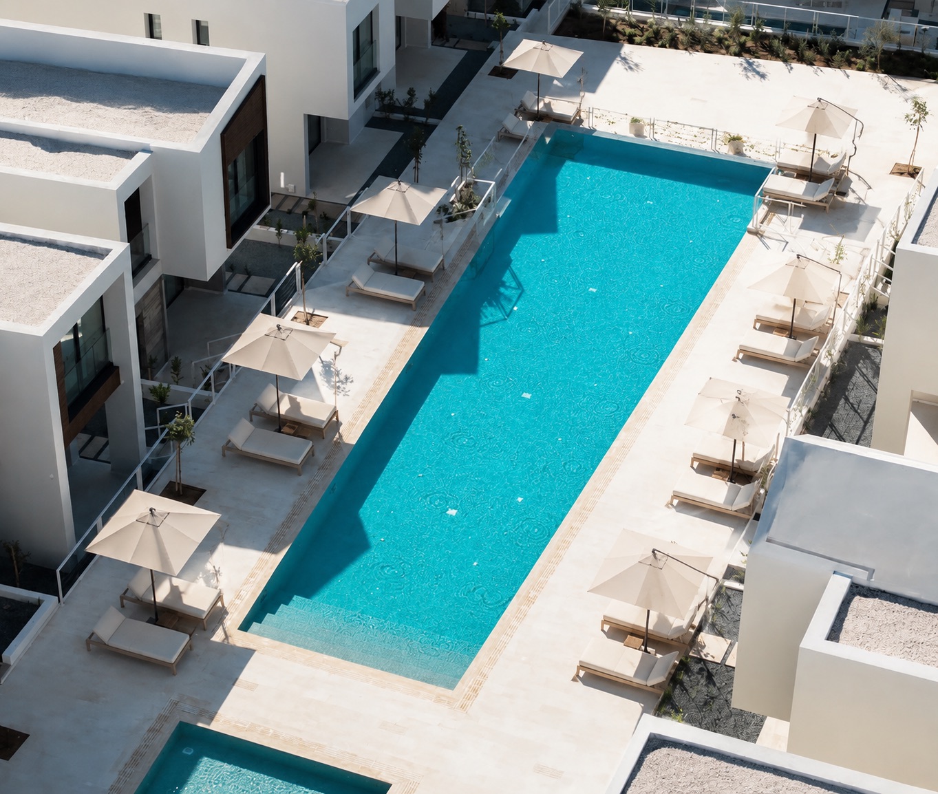Aerial view of the Avalon Gardens resort pool and sun terrace