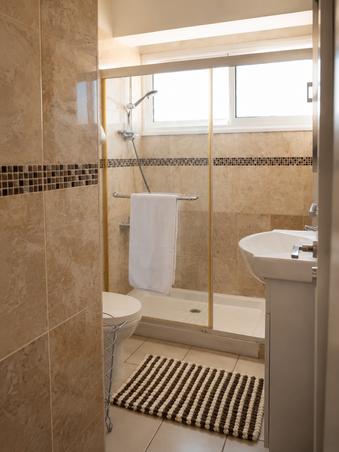 Bathroom with enclosed shower at Pervolia 206 Apartment in Paphos