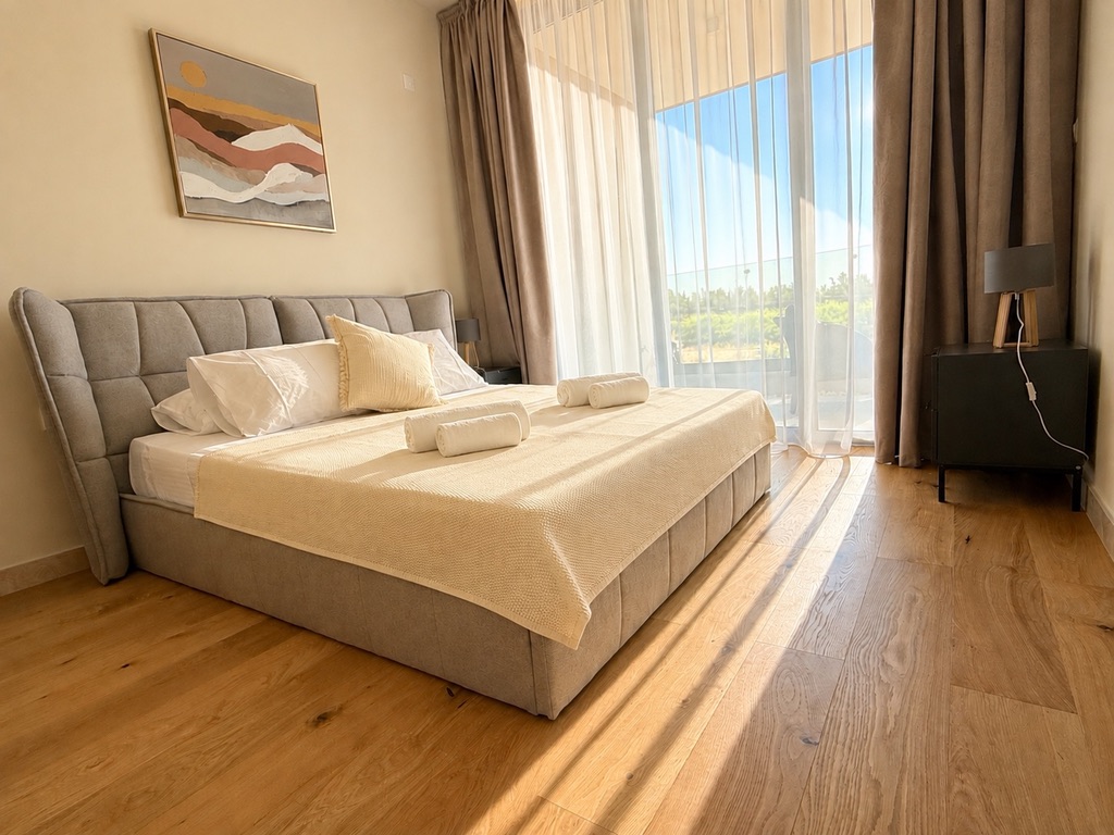 Sunny bedroom with terrace access at Avalon Gardens B203