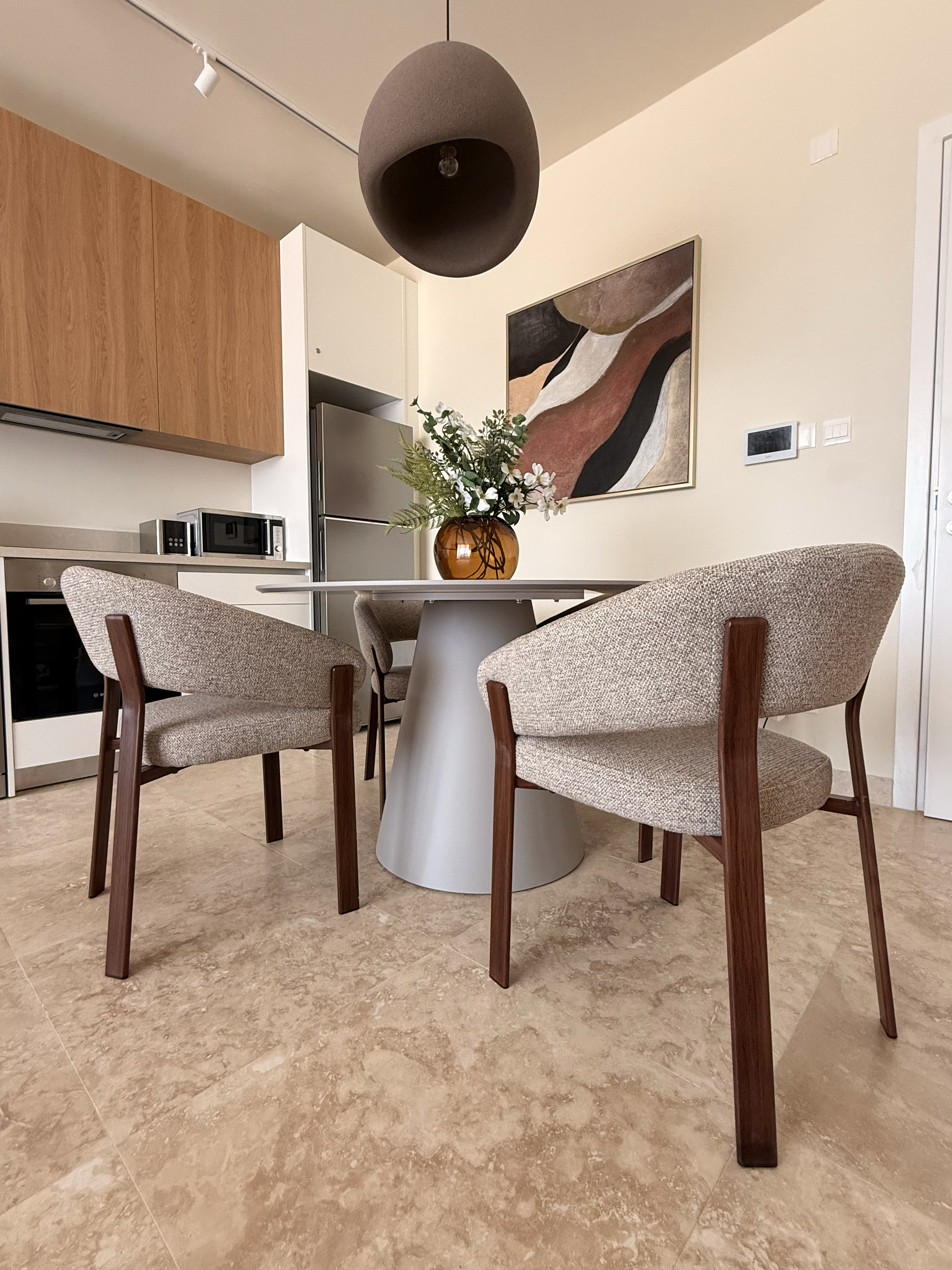 Dining area and fully equipped kitchen at Avalon Gardens A202