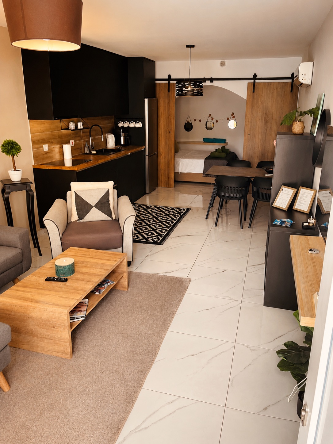 Open-plan living, dining and kitchen area at SeaGarden Hideaway in Paphos